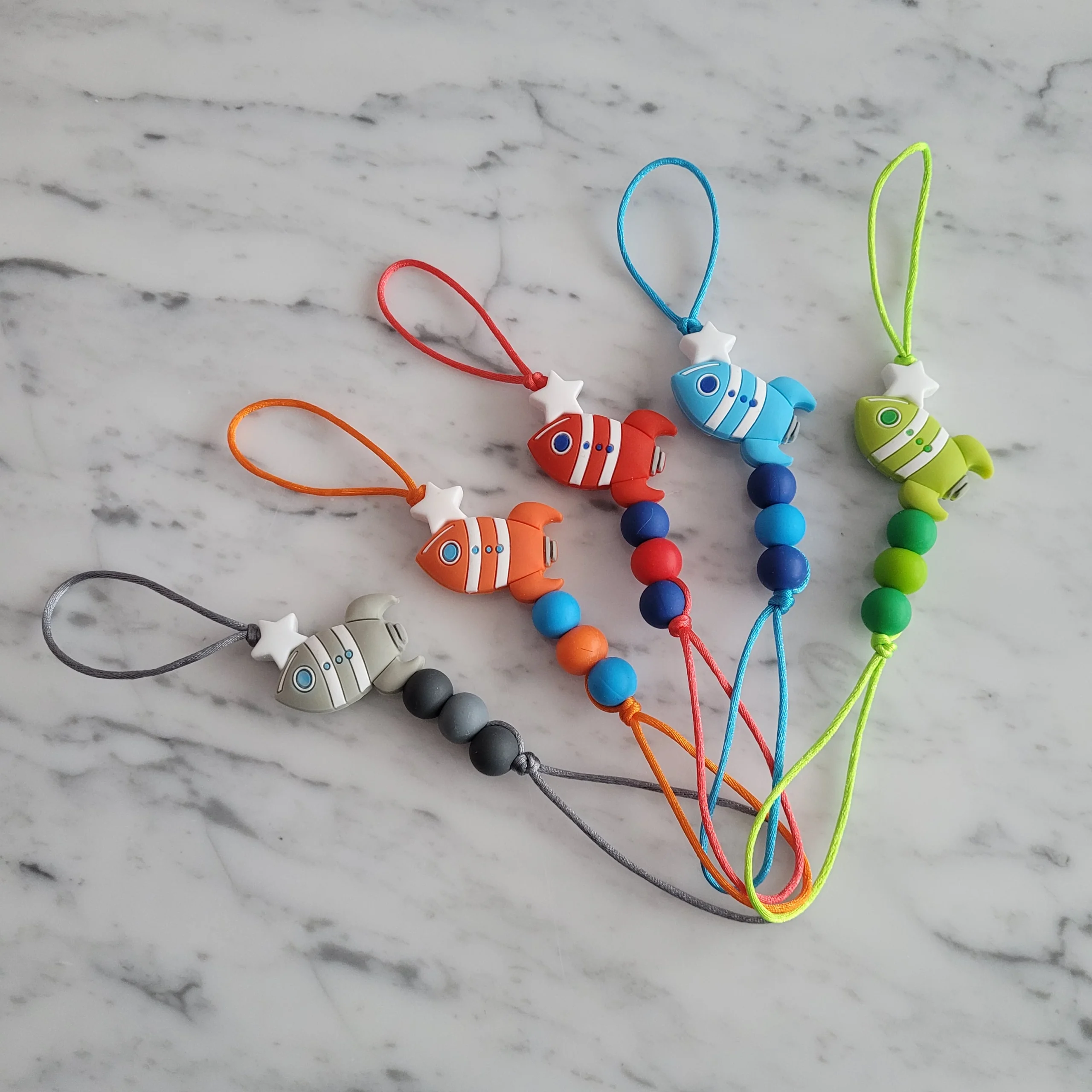 Attache-suce ZIP, FUSÉE, pour la fermeture éclair