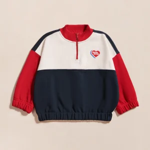 Le sweat Sonny en coton bio et col zippé - bleu / rouge