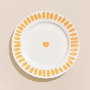 L'assiette Coeur jaune en porcelaine - 26 cm