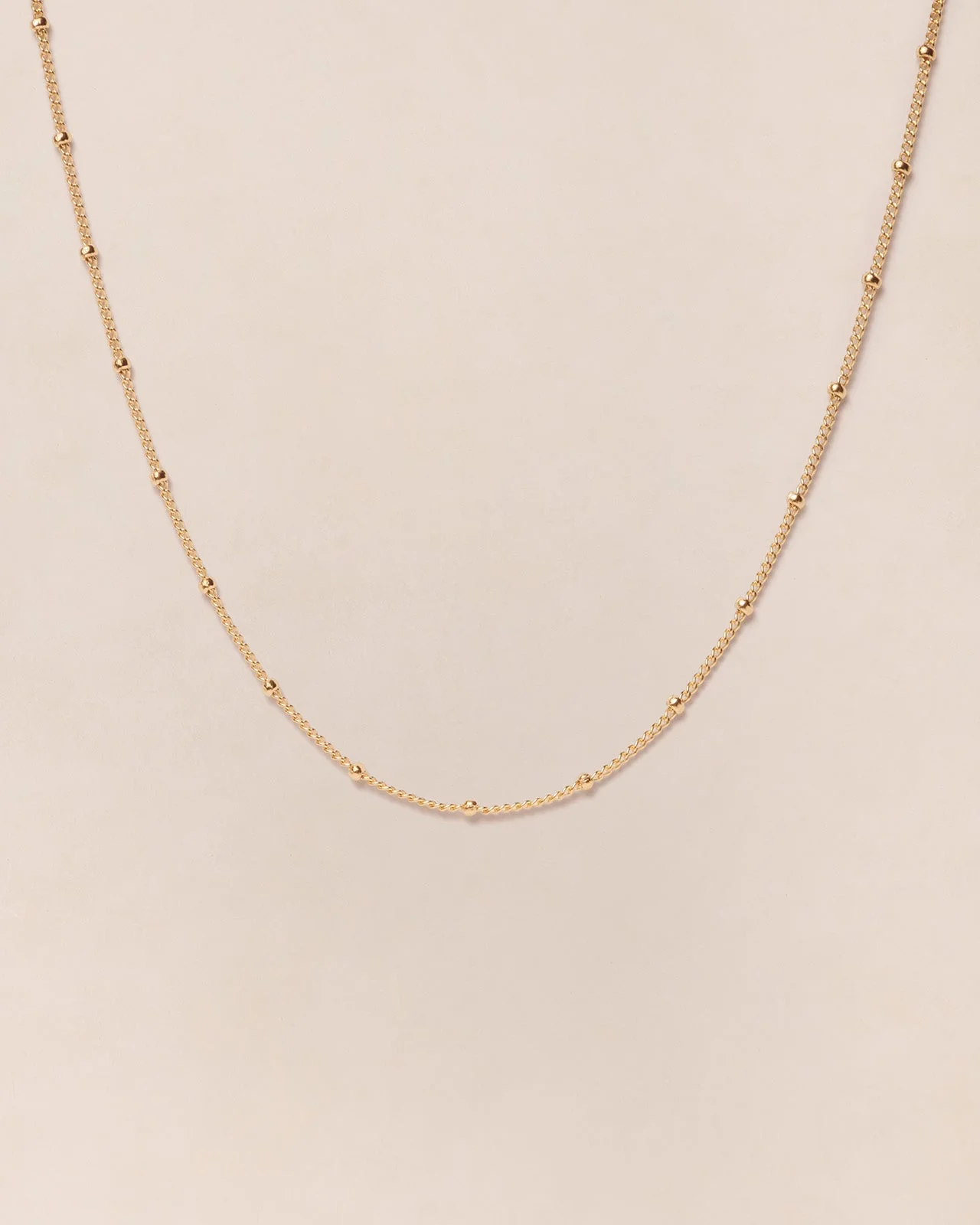 Le collier chaîne boules