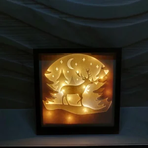 Cadre lumineux Noël - Cerf et Montagnes enneigées